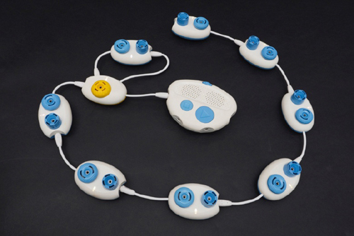 A photo of a Code Jumper program containing eight Play pods and a Loop pod in Port 1.