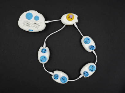 A photo showing a Code Jumper program with four Play pods, one Loop pod, and one Constant plug.