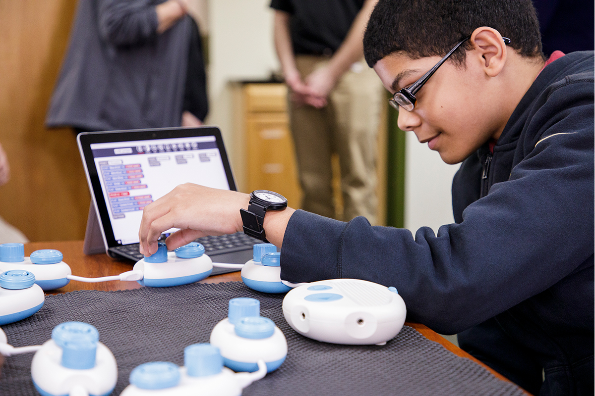 A student manipulates a Code Jumper play pod